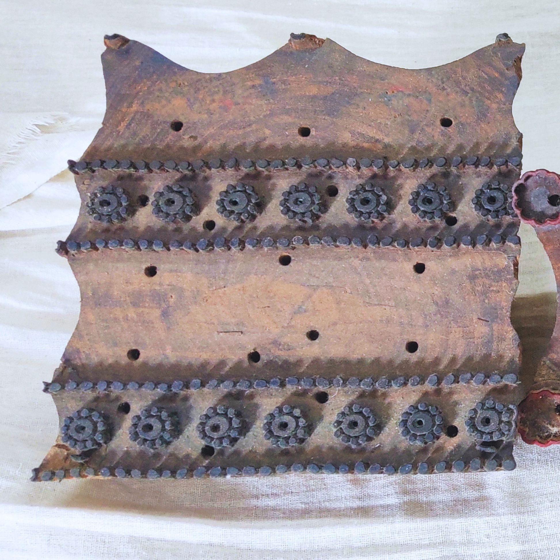 Close-up of hand block printed  floral motif craved on wooden block
