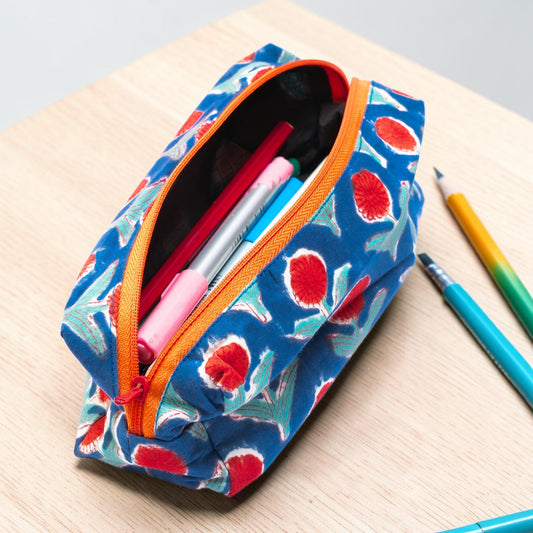 Cotton Hand Block Printed Floral-patterned pencil case with pens on a wooden surface